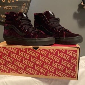 Women’s Vans Size 7. Color is red velvet and black trim and laces.